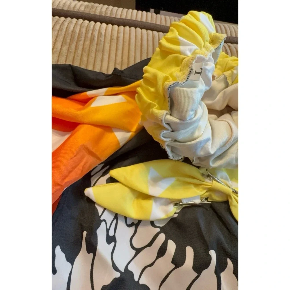 Like new condition women's size LARGE Halloween candy corn dinosaur skirt